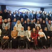 Tolga Büyükkaya ve toplantıya katılanlar